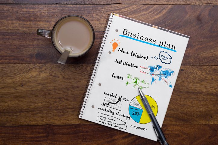 business plan notes on table