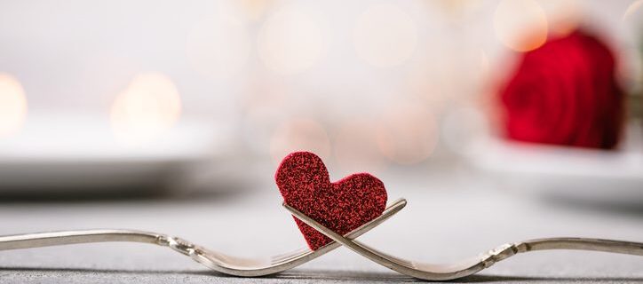 Valentine Day Forks and a heart. Holiday menu for Valentines Day.