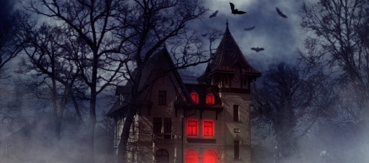 Halloween creepy house with bats and red light from the windows, Halloween theme